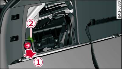 Luggage compartment: Knob for releasing towing bracket